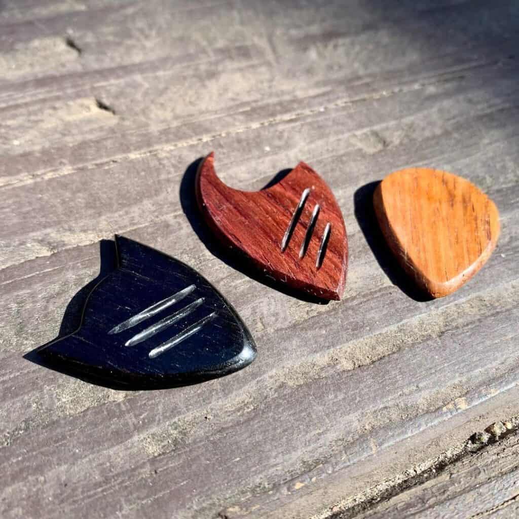 3 guitar picks made by GT Plectrums