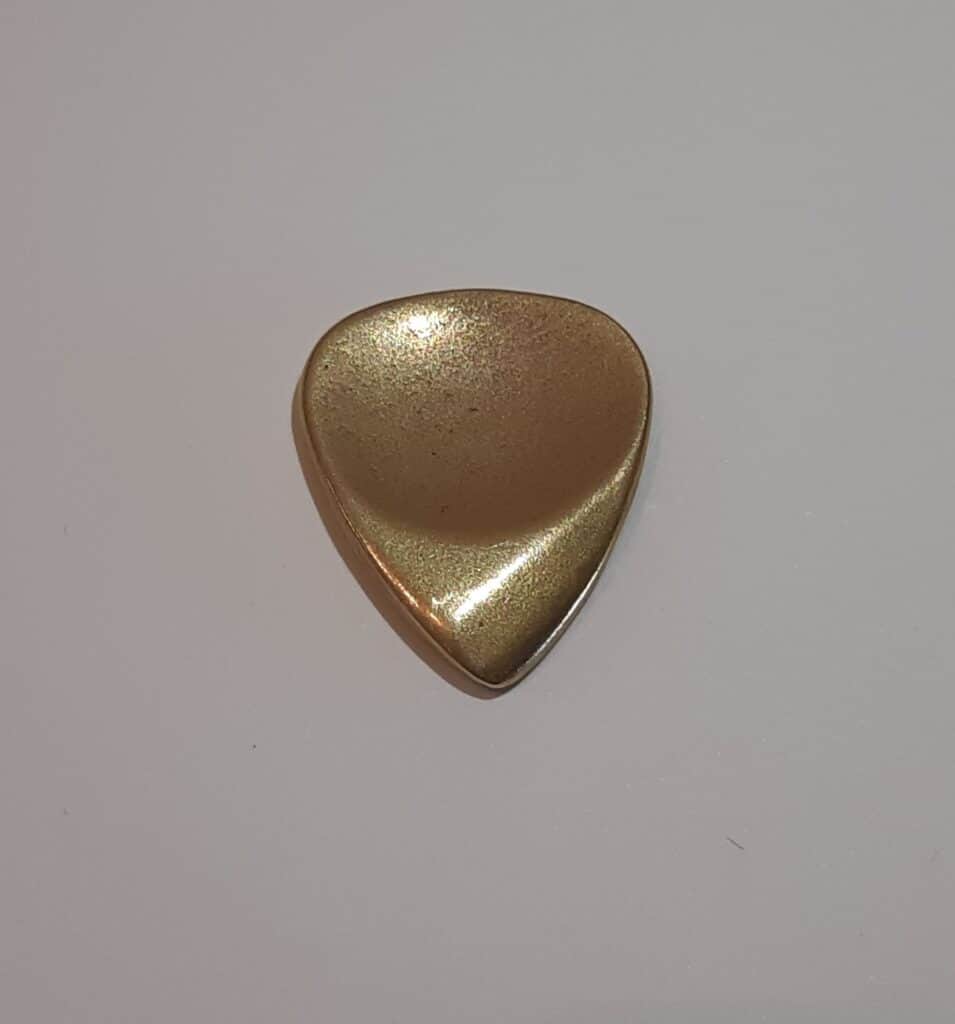 the thumb recess of a dugain minidug brass pick