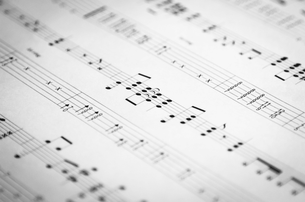 sheet music notation can explain the rhythm, and help players reading guitar tabs