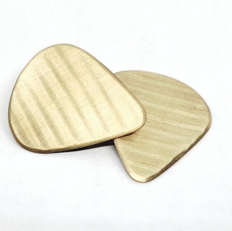 Crash Cymbal Bronze Guitar Pick By WanderingHandsStudio