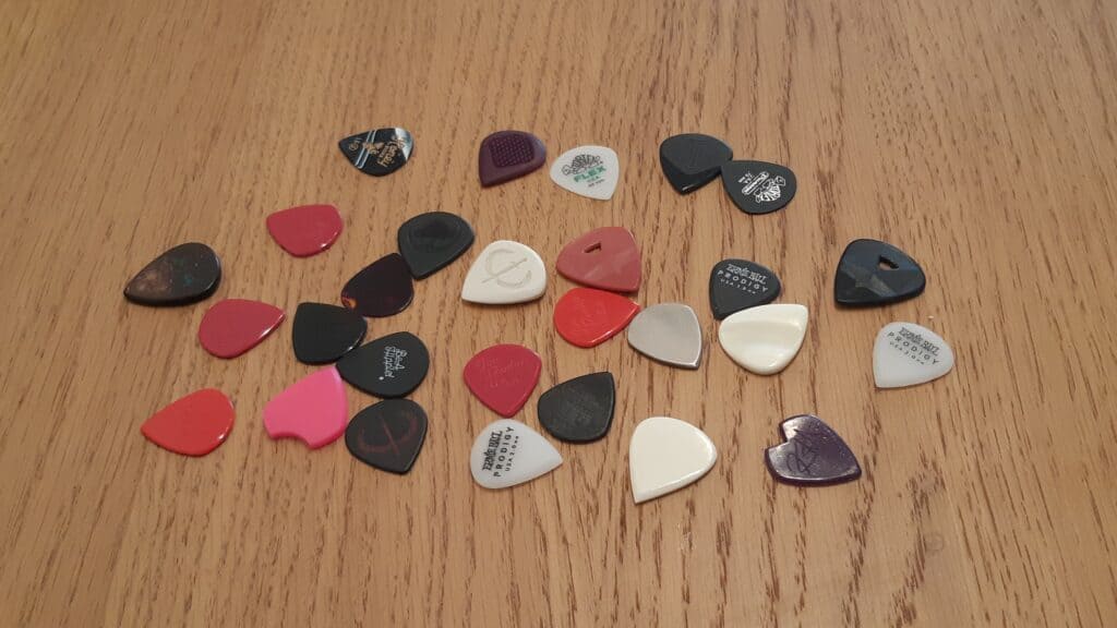 Jazz III shaped guitar picks made by different makers