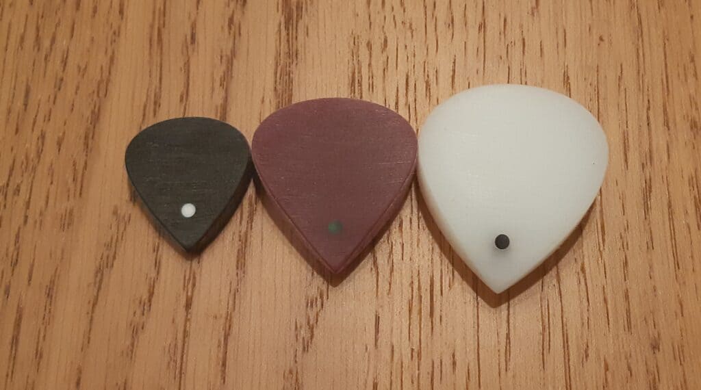 Purple Plectrums' Ares, Achilleus, and Zeus side by side