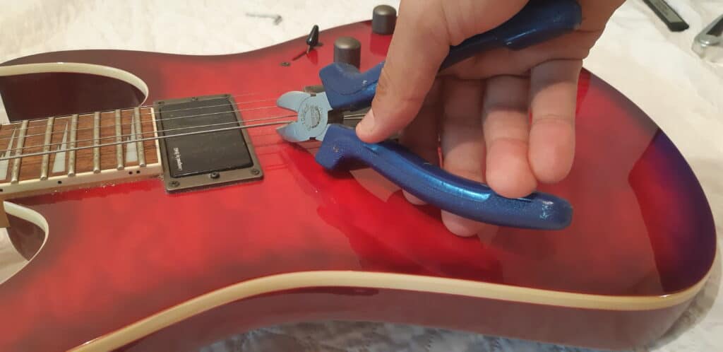 Removing the strings from the guitar