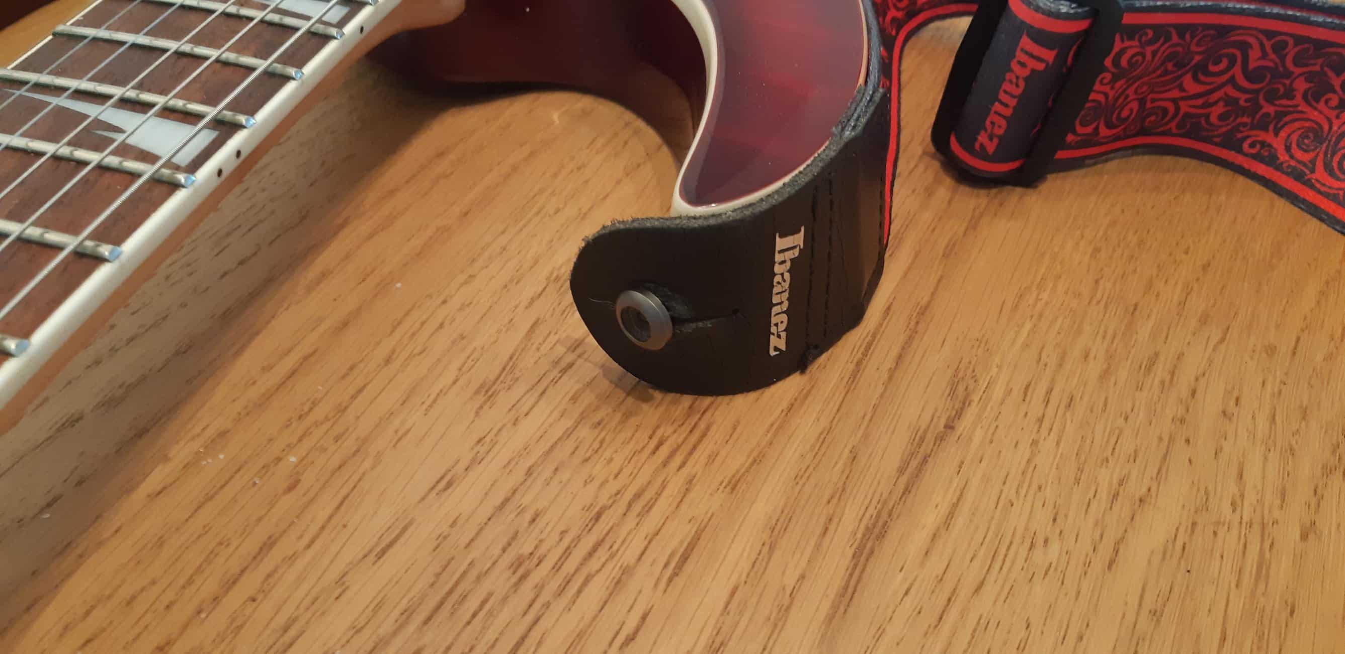 How To Put On A Guitar Strap? Step By Step Guide