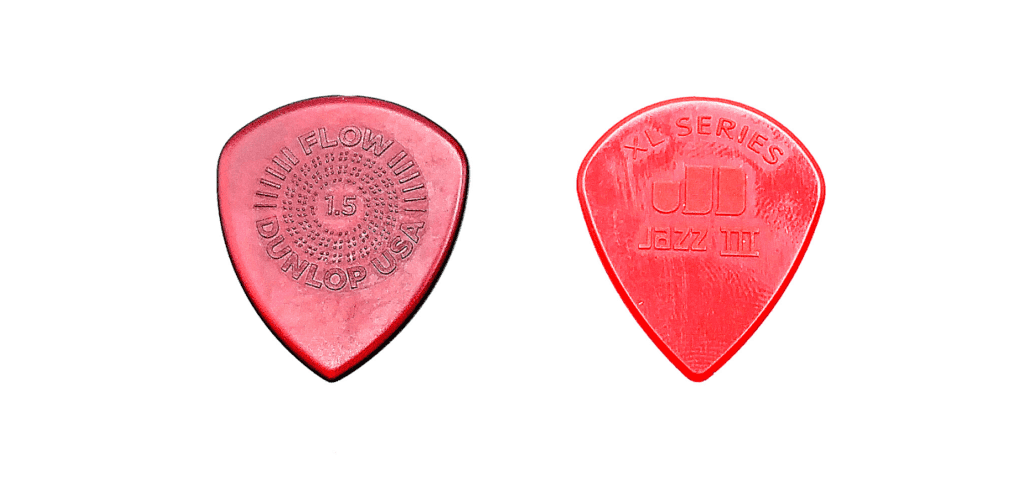 Dunlop Flow standard next to Dunlop Jazz XL Guitar Pick