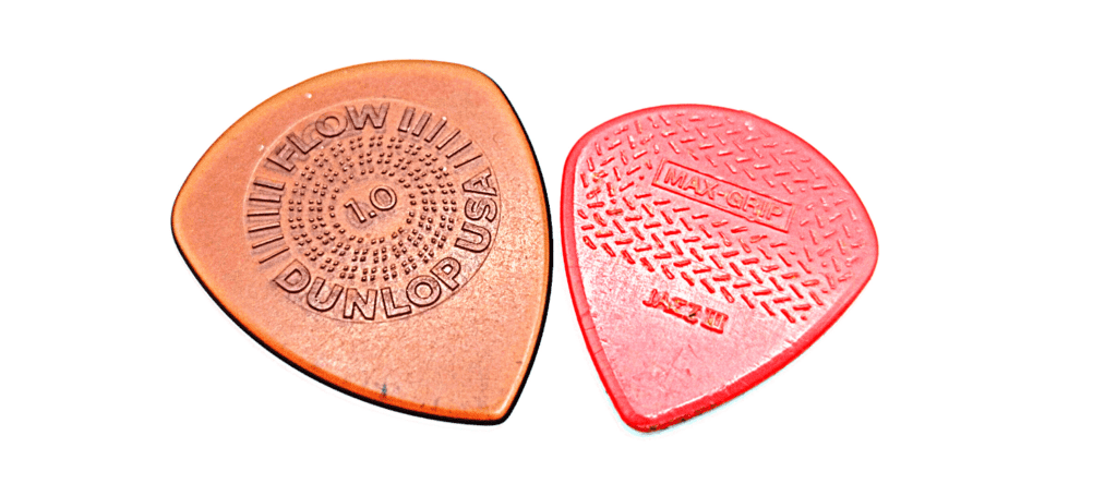 Dunlop Prime Grip on a Flow Pick and Max Grip on a red Jazz III pick