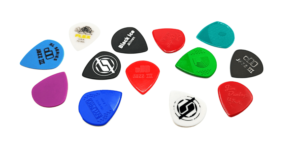 Jazz III Surrounded By Other Jazz III Shaped Guitar Picks