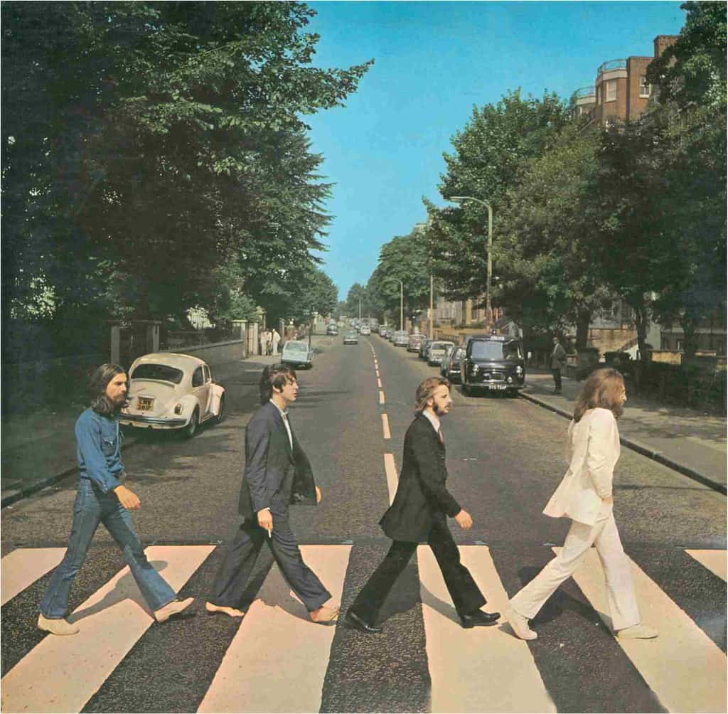 From left to right: George Harrison, Paul McCartney, Ringo Star, and John Lennon in the cover of the Beatles album: Abbey Road