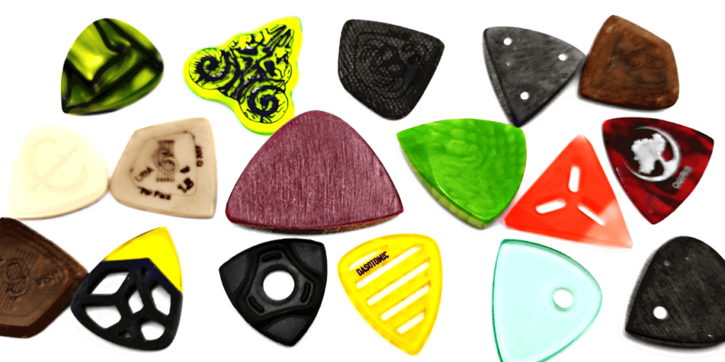 IROC, Faux Ivory, Kirinite, PEEK, Glass filled Nylon, Graphtex, Juma, UMHW-PE, Acrylic, and 3D ptinted guitar picks.