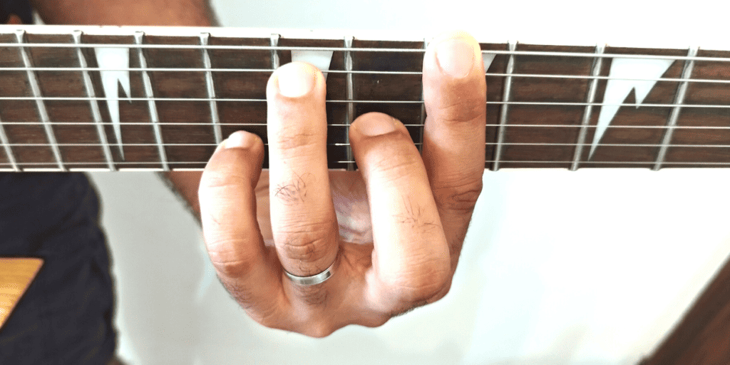 Try placing each finger as close as reasonably possible to the next fret to avoid buzz and dead notes