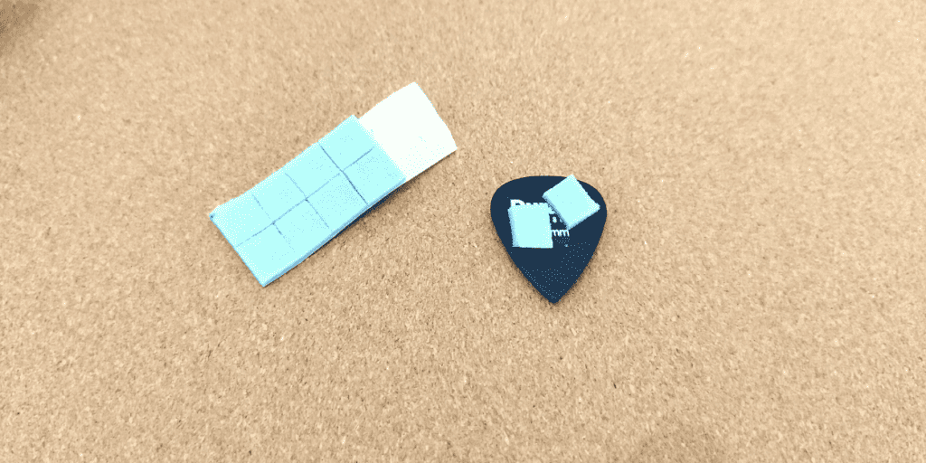 You can use the excess as a really cool guitar pick grip