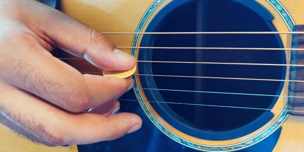You can also reduce pick click by relaxing your grip over the pick
