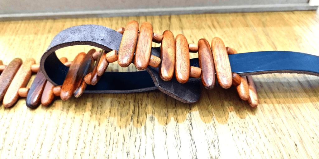 The first method of attaching a revo wooden strap to its leather connector piece
