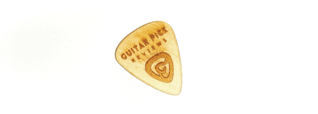 A custom wooden guitar pick made for me by Tree Picks