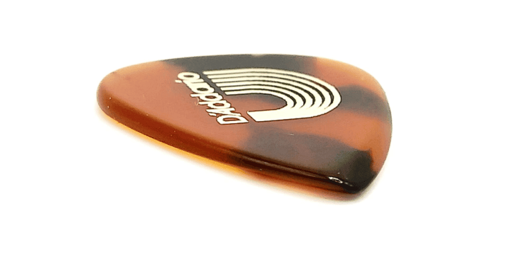 The speed bevel of the standard shaped D'Addario Casein Pick